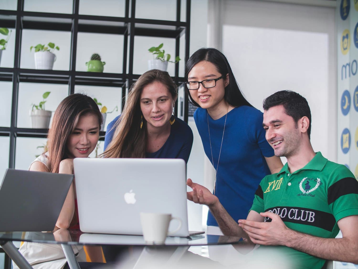The SMAART Loans team collaborating in the office